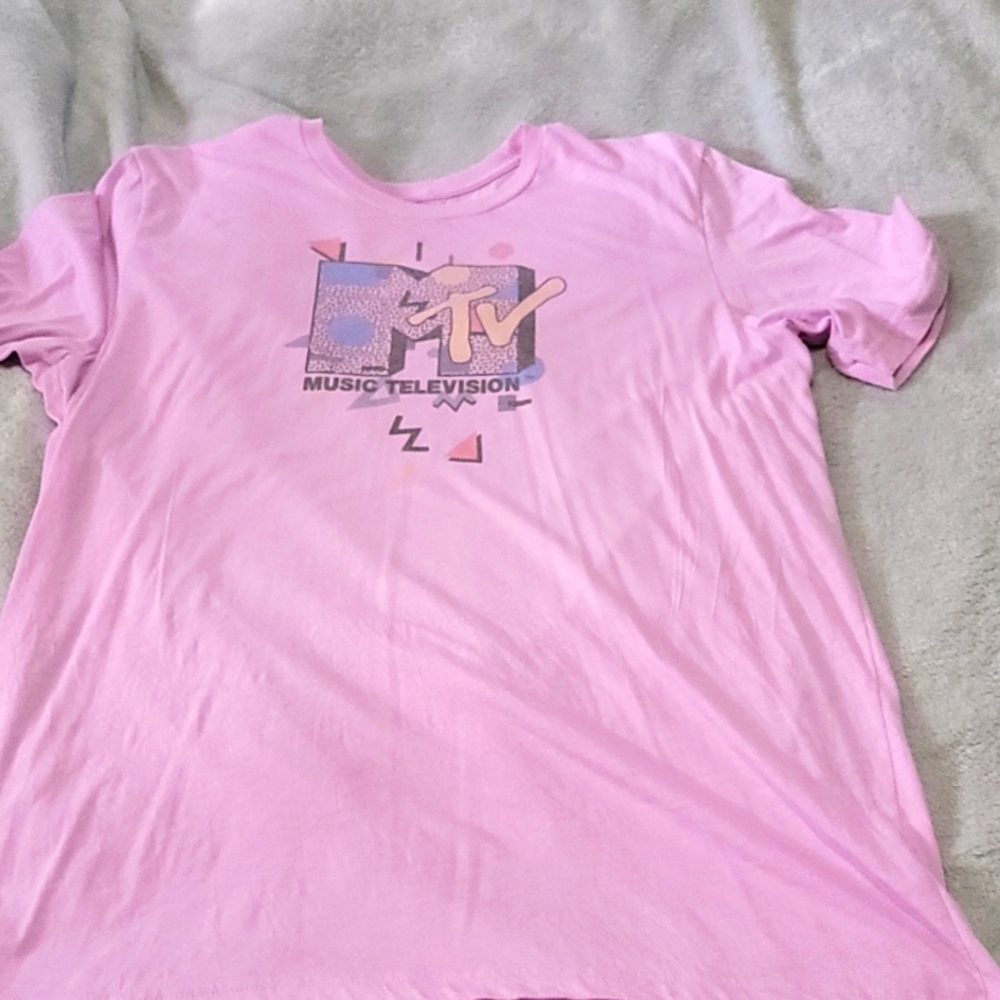 Lilac colored shirt with graphics